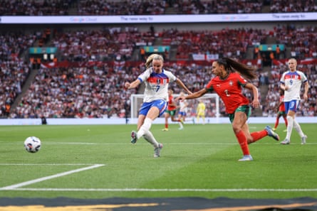 Beth Mead scores England’s fourth in a rampant first half against Portugal.