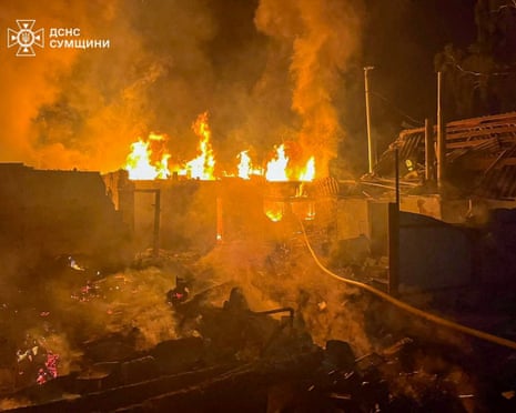 A firefighter works at the site of a Russian drone strike, amid Russia's attack on Ukraine, in the Sumy region.