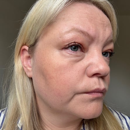 The writer, Liesl, is pictured in close up to show the Giorgio Armani Vertigo Lift Mascara on her eyelashes, She has long blond hair, white skin and wears a blue striped shirt.