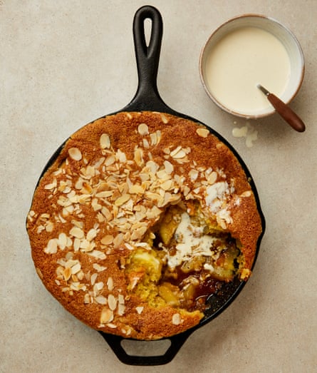 Yotam Ottolenghi's apple and pear eve's pudding with vanilla cream.