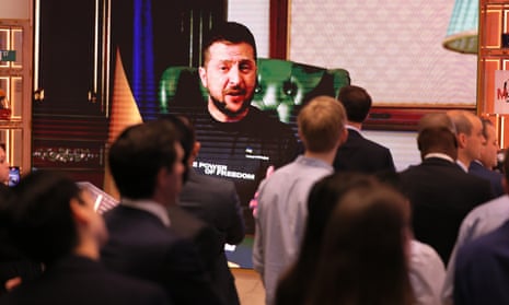 Volodymyr Zelenskiy delivers a message virtually at the New York Stock Exchange before the ringing of the opening bell in New York City.
