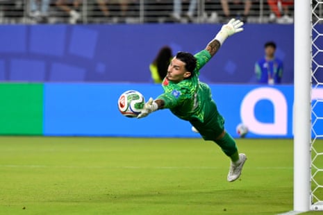 Turkey goalkeeper Ugurcan Cakir (23) makes a save.