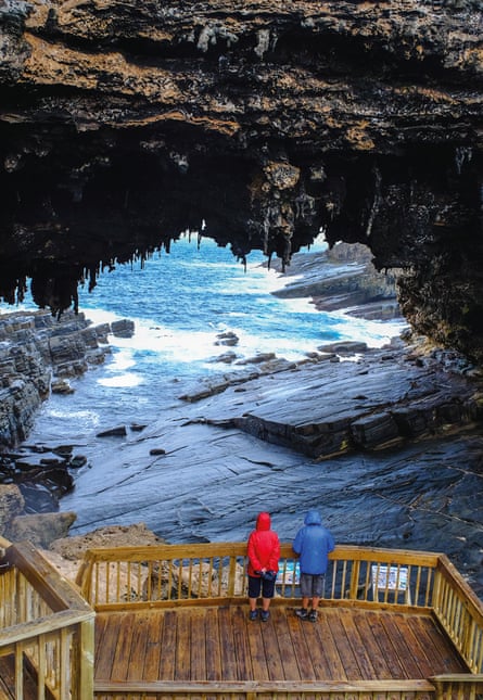 Tourists visit the cave of Admirals Arch on Kangaroo Island, South Australia