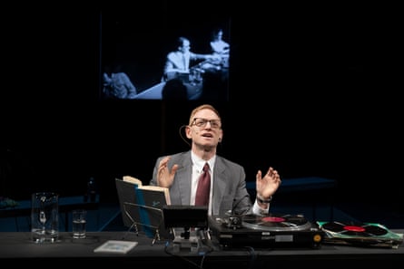 ‘It’s an act of channelling or ventriloquism’ … Scott Shepherd, with Spalding Gray on screen in the background.