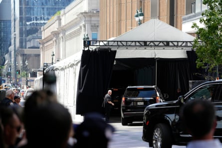 an SUV pulls up to a tent