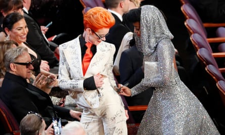 Janelle Monáe signing Sandy Powell’s outfit at the Oscars
