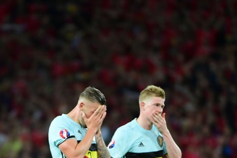 Toby Alderweireld and Kevin De Bruyne look shocked at that defeat by a dominant Wales.