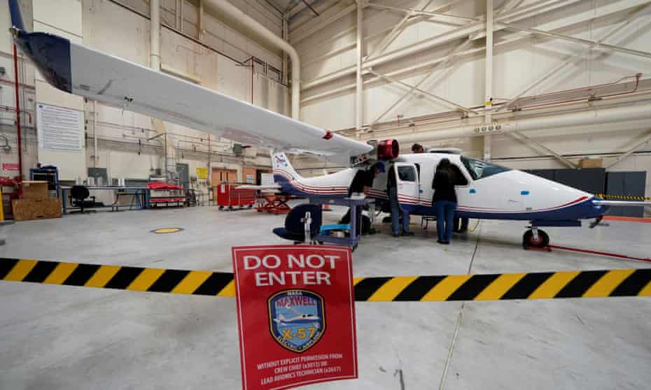 Technicians work on Nasa’s first all-electric plane, the X-57 Maxwell, at the Armstrong Flight Research Center at Edwards Air Force Base, in California.