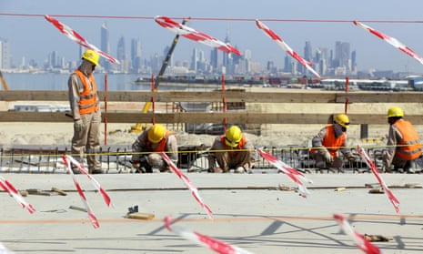 Road to ruin? … Labourers at work on the Sheikh Jaber Al-Ahmad Al-Sabah causeway in Kuwait City in February.