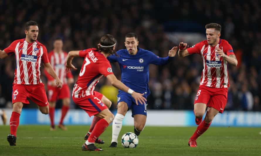 Filipe Luis, then with Atlético, faces his former Chelsea teammate Eden Hazard in 2017. ‘Five minutes before games he’d be playing Mario Kart,’ he says of the Belgian.