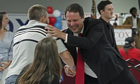 Dan Cox shakes hands with a supporter on primary night in Emmitsburg, Maryland.