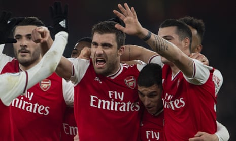 Sokratis Papastathopoulos, centre, celebrates his goal against Manchester United on Wednesday.