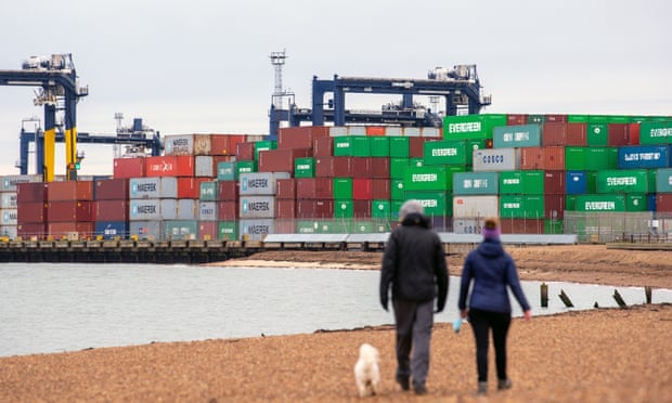 Shipping containers are unloaded at Felixstowe in Suffolk.