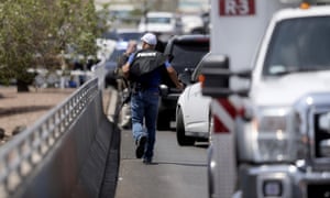A police officer runs toward the scene of the El Paso shooting. ‘The fact that we’re seeing this threat globally now could lend us some hope,’ Johnson said. 2328.jpg?width=300&quality=85&auto=forma