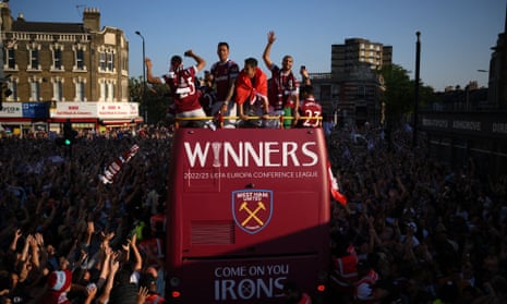 West Ham players take an open-top bus tour through East London on Thursday evening.