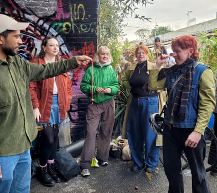 People take part in the conkers championships in Peckham