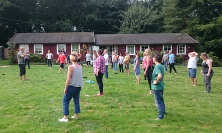 Guests, stand outside, during a Mindfulness Retreat, Suffolk.
