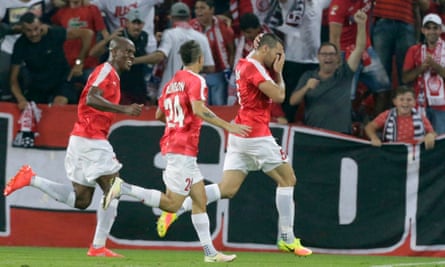 Hapoel Beer Sheva’s Shir Tzedek, right, celebrates after scoring the only goal of the Champions League third round qualifying tie against the Greek side Olympiakos, giving the Israeli champions a place in the play-off round and a meeting with Celtic.