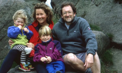 Alison Hargreaves and Jim Ballard with their children, Kate and Tom, when they were young, sitting on rocks