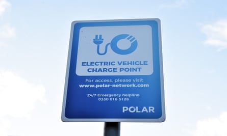 An electric vehicle charging pod point sign in Stoke-On-Trent, England.