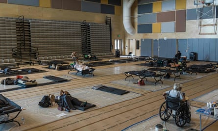 People at a cooling center at Kellogg middle school in Portland, Oregon.