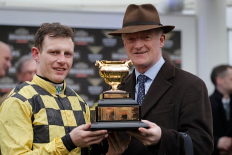 Paul Townend and trainer Willie Mullins with the trophy after victory on Al Boum Photo.