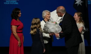 Scott Morrison gives flowers to his mother Marion and wife Jenny as he takes the stage at the Liberal partyâs 2019 Australian federal election campaign