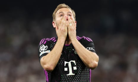 Harry Kane of Bayern Munich looks dejected after his team’s defeat and elimination from the Champions League.