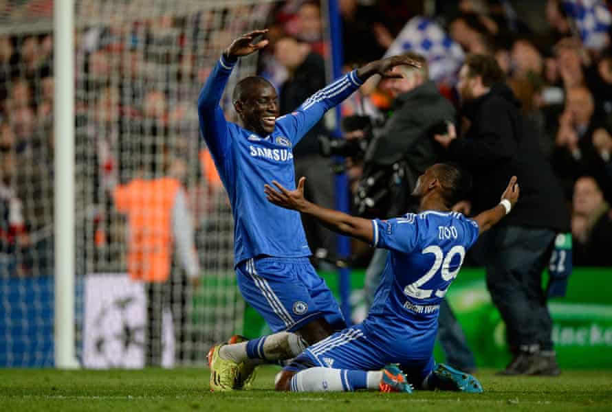 Demba Ba and Samuel Eto’o celebrate as Chelsea knock PSG out of the Champions League.