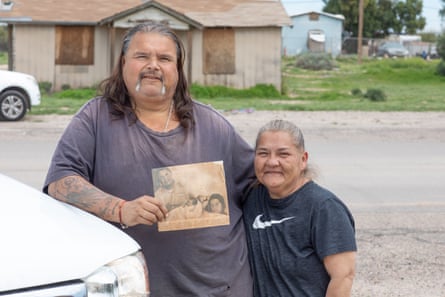 ‘We’re not giving up no matter what they offer,’ said Guadalupe Felix, pictured with her husband, Esteban Valencia. ‘This plant is going to kill us, we’re already suffocating.’
