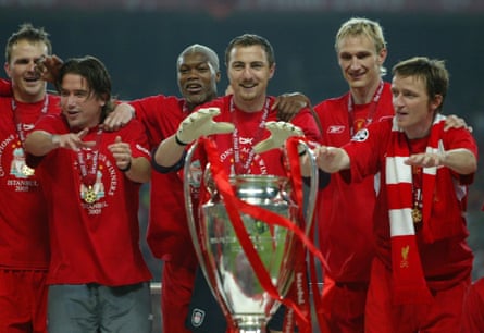 Jerzy Dudek with his Liverpool teammates and the trophy after the European Cup final in 2005.