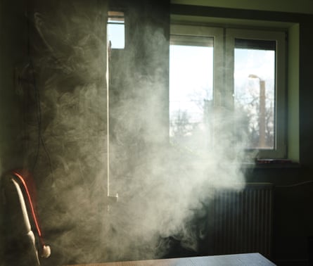 White vape smoke indoors, backlit by sunlight