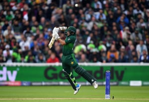 Imam Ul Haq of Pakistan plays a shot into the air which is caught by Martin Guptill of New Zealand.