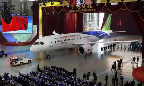 Visitors stand next to a turbofan jet of ZYB Lily Jet on display during the  Asian Business Aviation Conference and Exhibition 2013, known as ABACE 201  Stock Photo - Alamy