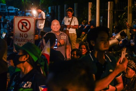 Protesters gather outside the senate, after gunshots heard inside the Philippine Senate building.