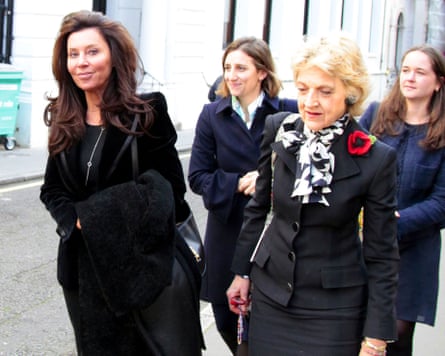 Anna Standish (front left) with divorce lawyer Fiona Shackleton (front right) outside the court in London.
