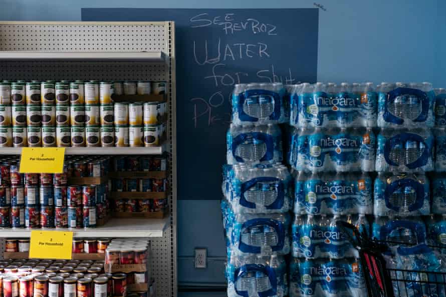 Brightmoor Connection Food Pantry Managing Director Reverend Roslyn Murray-Bouier saves water bottles for those whose water has been shut off on Saturday, Jan. 26, 2019 in Detroit, Mich. Erin Kirkland for the Guardian