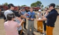 Michelle Henderson, third from right, on the job for AAP, one week before Black Saturday in 2009, when the Bunyip fires were burning in Gippsland. Speaking is the former Victorian premier John Brumby.