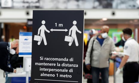 A social distancing sign in Rome in March 2020