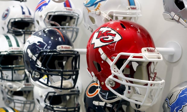 NFL team helmets are displayed at the NFL Headquarters in New York on 3 December 2015.