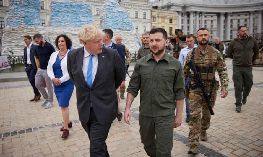 A handout photo made available by the Ukrainian Presidential Press Service shows Ukrainian President Volodymyr Zelensky (R) and British Prime Minister Boris Johnson (L) walking on the square near St. Mikhailovsky Cathedral in Kyiv (Kiev), Ukraine, 17 June 2022.