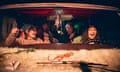 A group of young people in a van in a scene from Gasoline Rainbow
