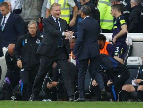 Everton manager Ronald Koeman and Brighton manager Chris Hughton shake hands after the game.