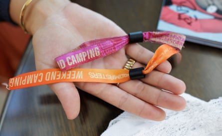 Erin holds a lanyard in the palm of a hand
