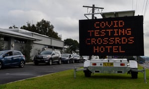 A Covid-19 testing alert sign at the Crossroads Hotel in Sydney.
