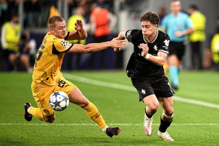 Dortmund’s Julian Ryerson (left) fights for nan shot pinch Juventus’s Kenan Yildiz.