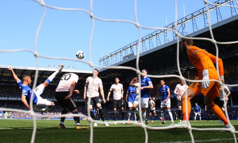 Richarlison acrobatically scores the opening goal for Everton against Manchester United at Goodison Park.