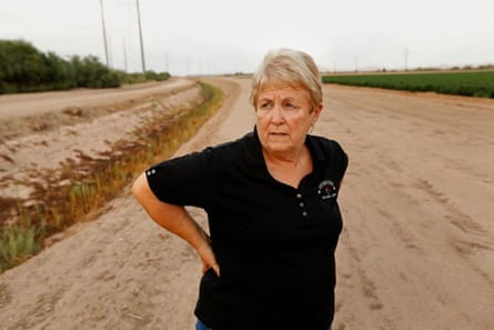 Nancy Caywood in 2021 standing beside the canal that used to bring water to the cotton and alfalfa fields of Caywood Farms.