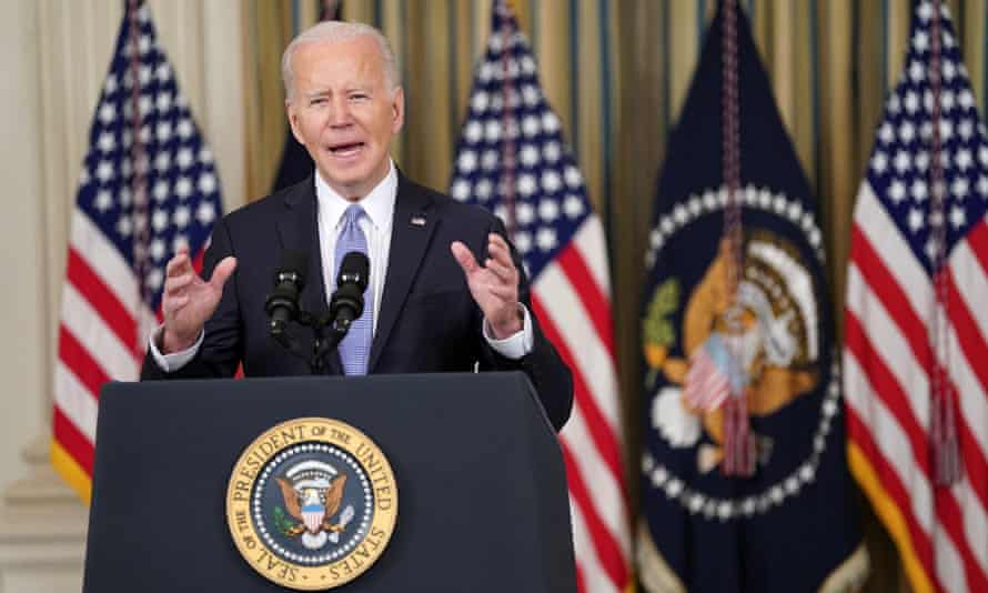 Joe Biden addresses reporters about the March jobs report at the White House on Friday.