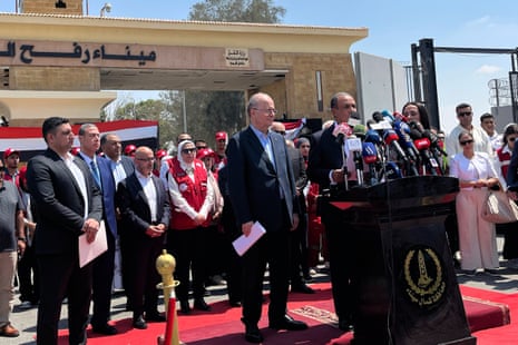 Palestinian prime minister Mohammed Mustafa, left on podium, and Egyptian foreign minister Badr Abdelatty, centre on podium, attend a press conference during their visit to Rafah crossing between Egypt and the Gaza Strip, Monday, 18 August 2025.